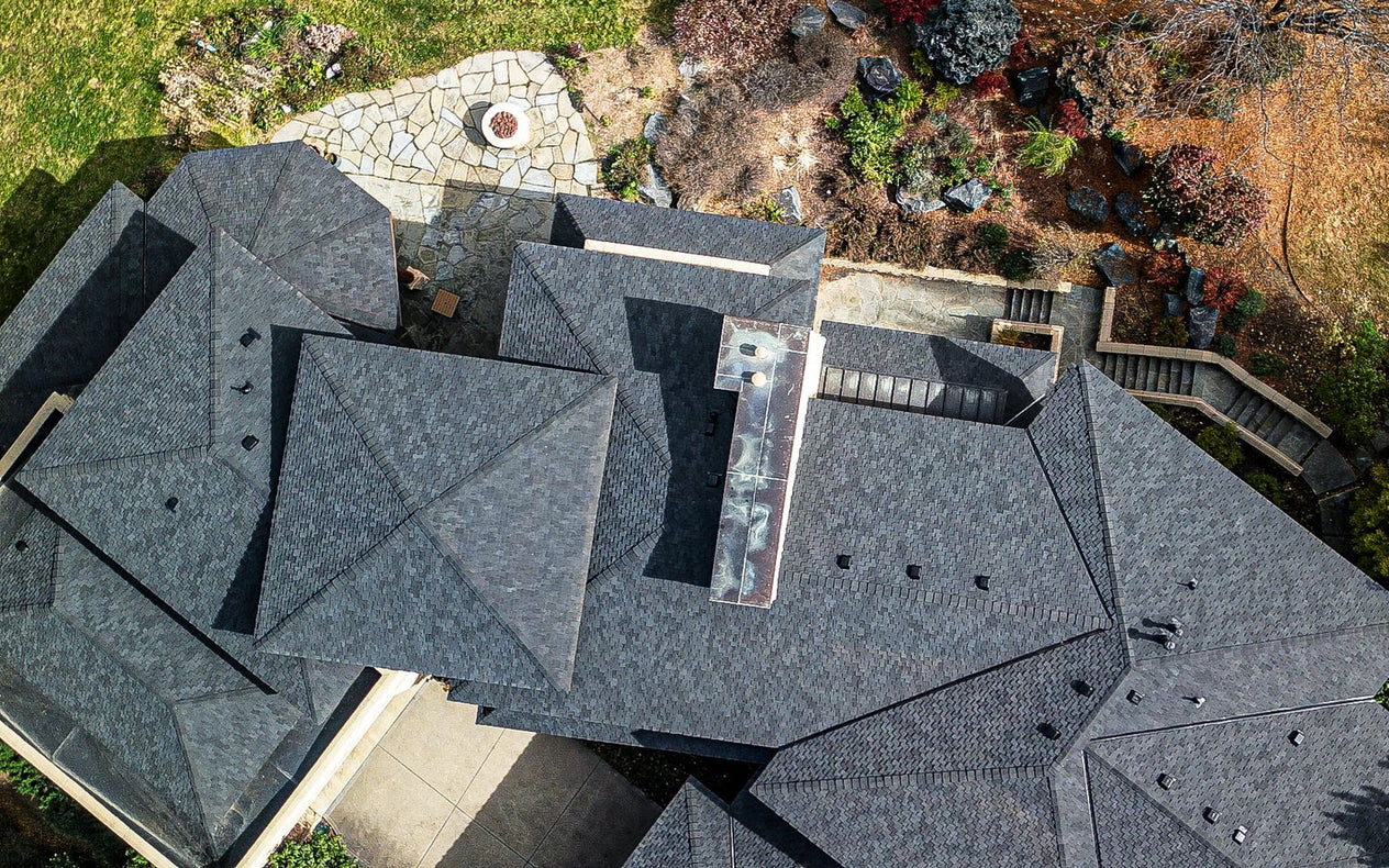 Three Pines Roofing crew completing a residential roof replacement in Denver